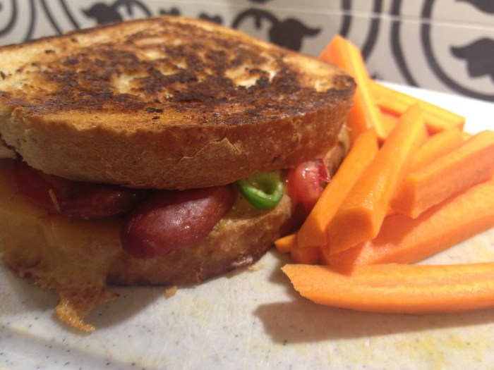 Hot dog toastie with homegrown tomatoes and mild green peppers. Photo by Amy Sowder.