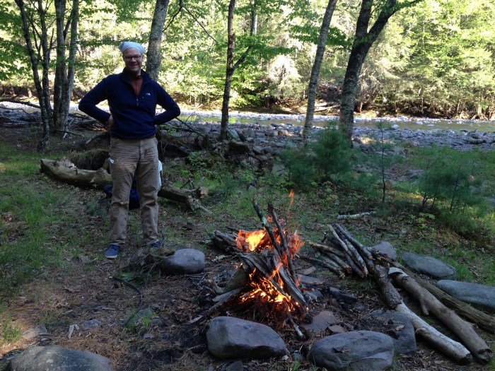 We will not be depending on the oldest cooking style known to mankind, such as this fire created by David. But gazing into a fire is like watching TV: You don't know why you keep doing it, but you do. Photo by Amy Sowder.